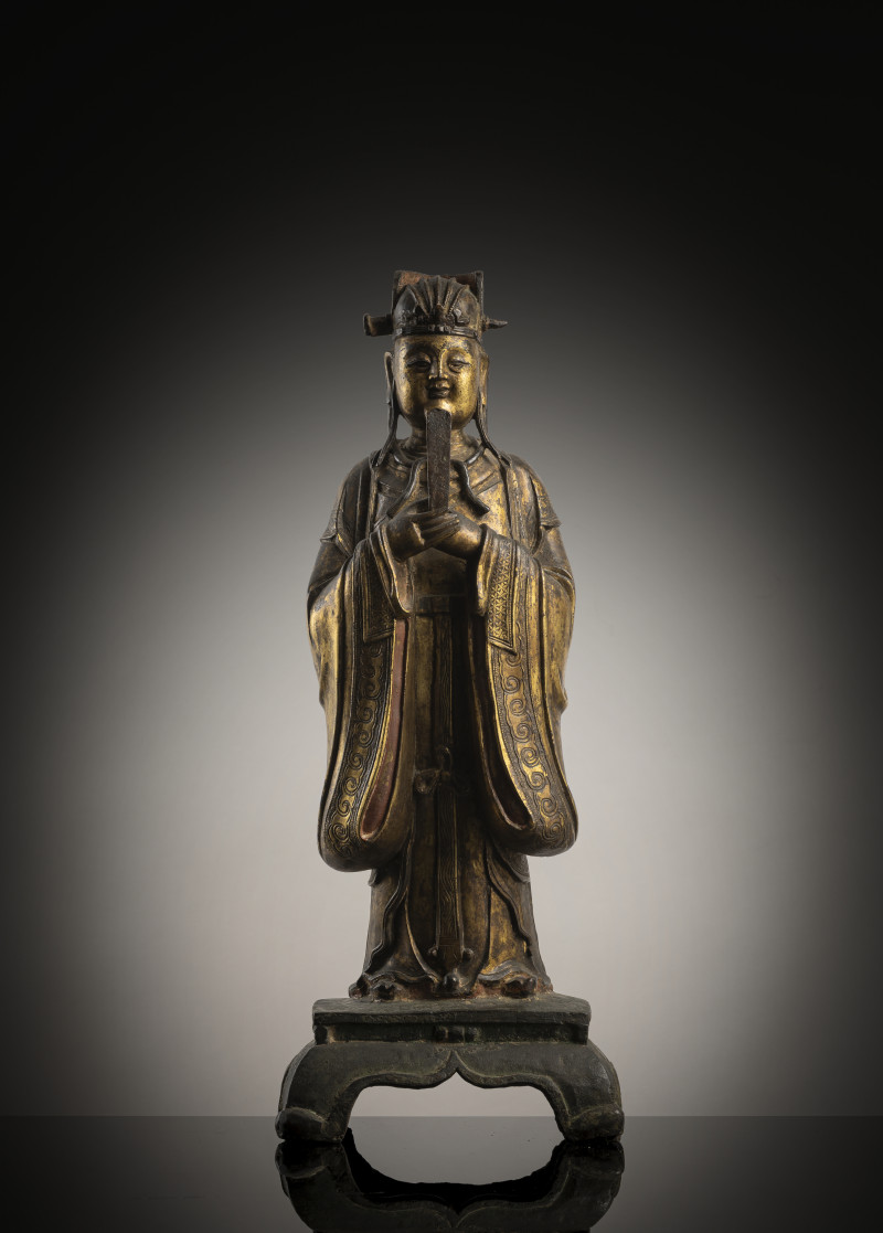 A gilt-bronze of Tianguan on a pedestal, holding a sceptre