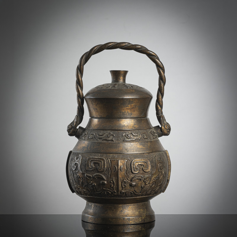 A bronze vessel 'hu' in archaic style with partial gilding