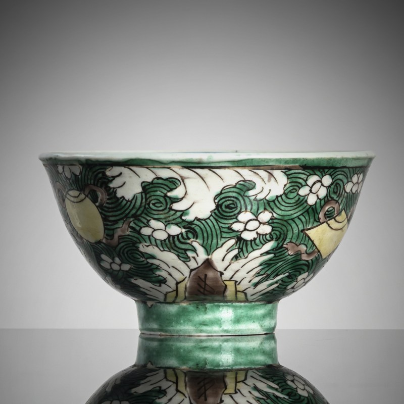 A blue and white and 'famille verte' porcelain bowl