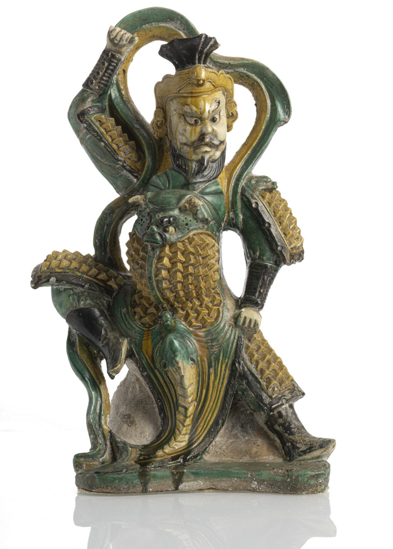 A large 'sancai'-glazed ceramic figure of one of the four heavenly kings