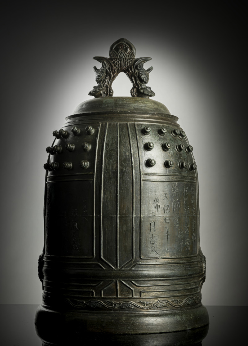 A large temple bronze bell with inscription