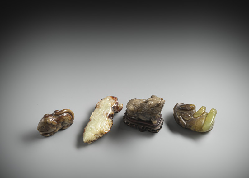 A group of four jade carvings, including mythical creatures and lions - 图2