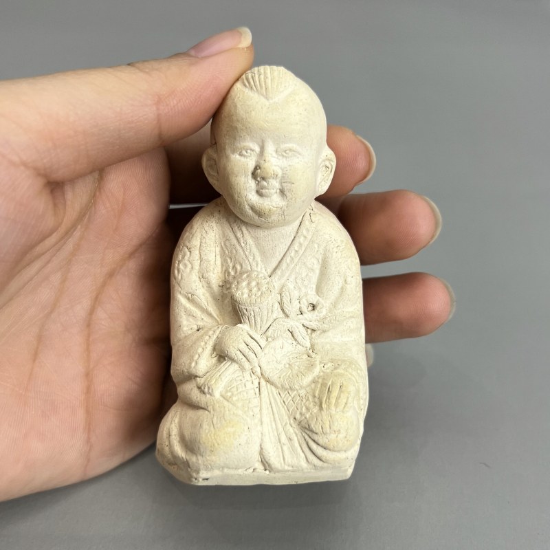 明代 素胎持莲童子 - 图12