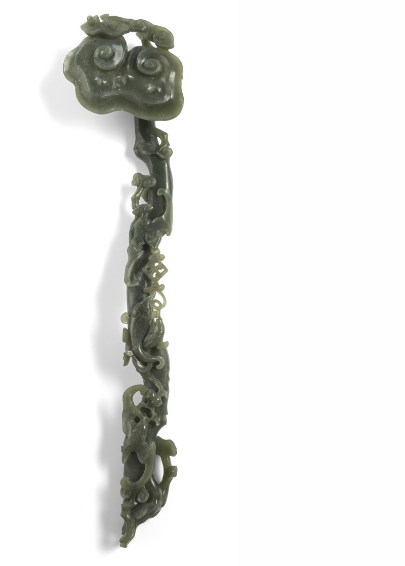 A fine carved spinach green jade sceptre with lingzhi, double fish and bats in relief