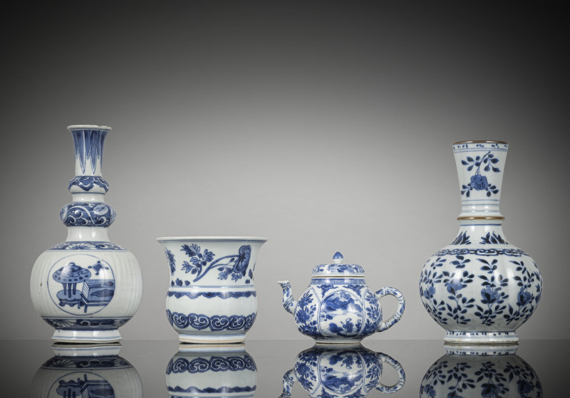Two vases, a spittoon and a teapot with cover, all with underglaze blue decoration