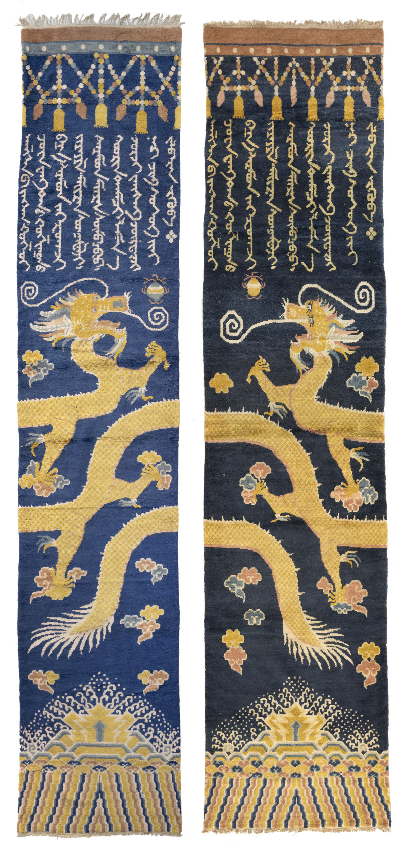 An unusual pair of pillar rugs