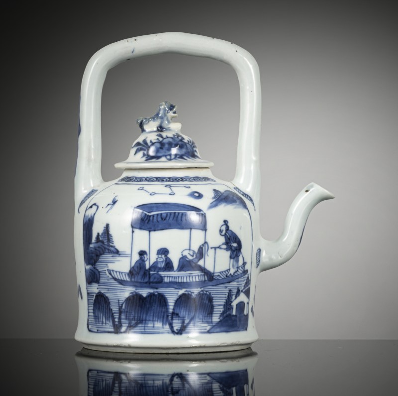 Underglaze blue teapot and cover with a bow handle with figure decoration in a boat and poem inscription