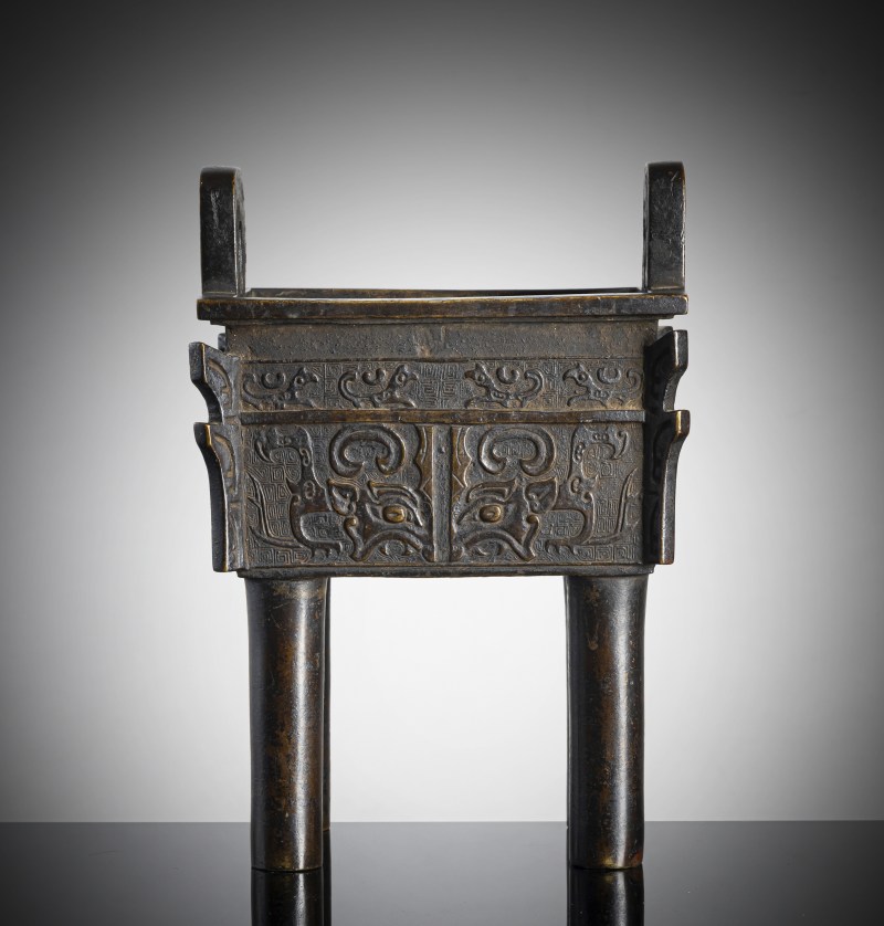 A bronze incense burner in the shape of the 'fang ding' food vessel in archaic style