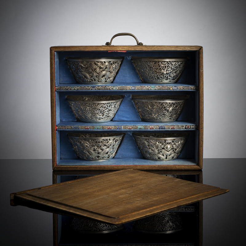 A set of six silver bowls with glass inserts in wooden box,
