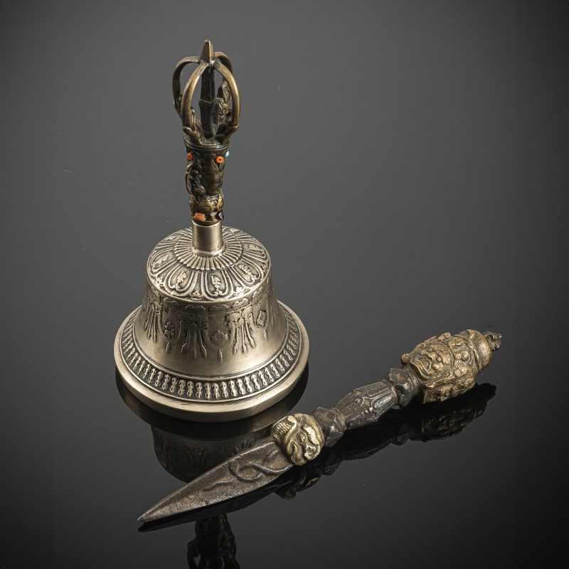 A metal bell (ghanta) and a phurbu