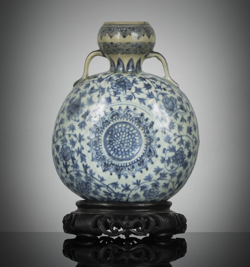 A rare blue and white porcelain pilgrim flask probably made for the Ottoman market on a wooden stand