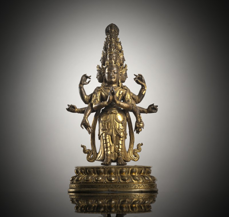 A GILT-BRONZE FIGURE OF EKADASHALOKESHVARA