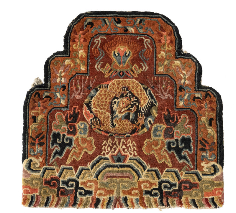 A Throne carpet and two rugs