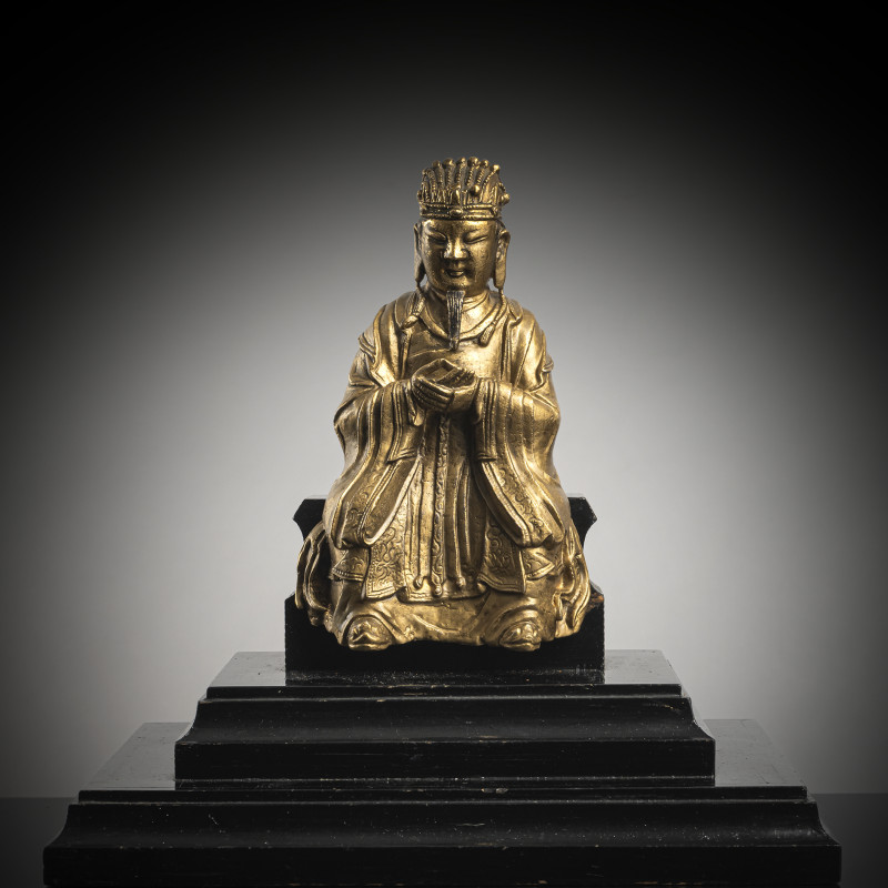A BRONZE FIGURE OF A DIGNITARY