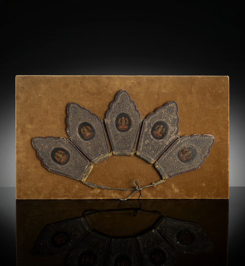 A painted papier-maché crown