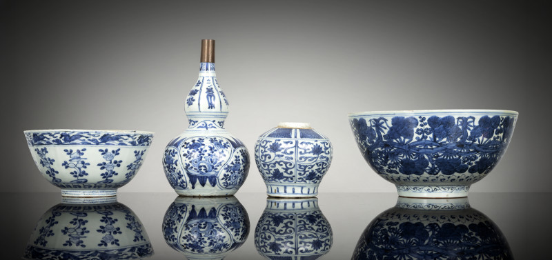 Two bowls, a vase and a jar, all with underglaze blue decoration