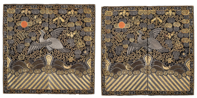 A pair of rank badges featuring herons in gold and silver embroidery