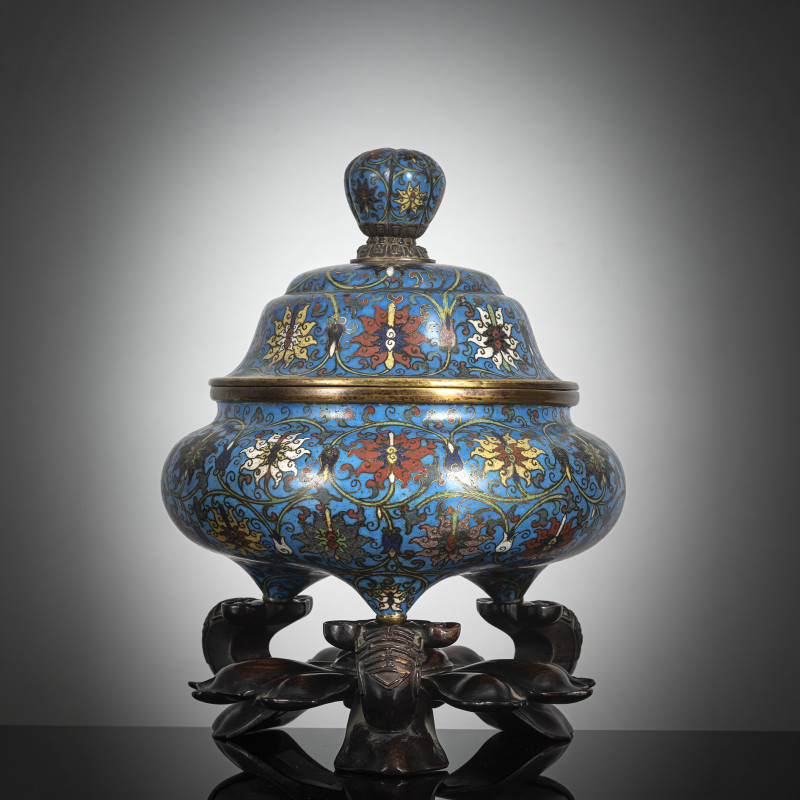 A good Cloisonné incense burner and cover, partially fire-gilt on a wooden stand
