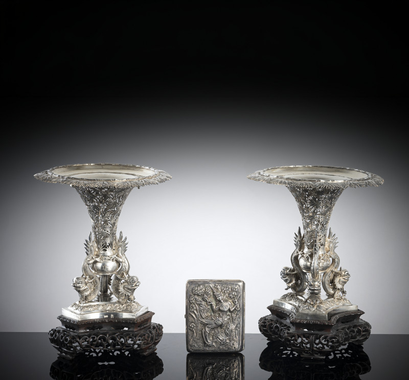 A pair of Chinese export silver compotes with dragon and bamboo decoration and a Thai silver cigarette case