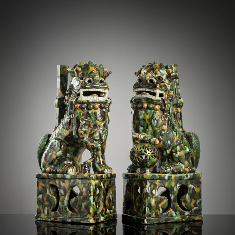 A pair of 'sancai' -glazed buddhist lion joss-stick lion holders