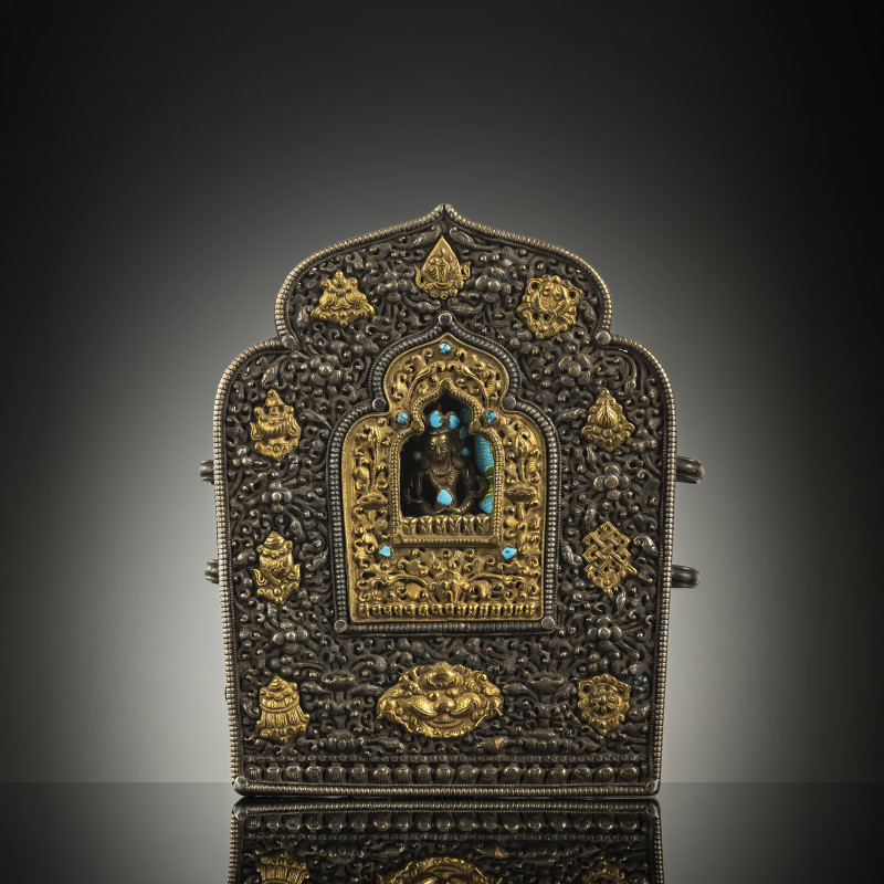 A copper gahu with partially gilded silver front with 'Buddhist emblems' and figure of Amitayus with turquoise inlays