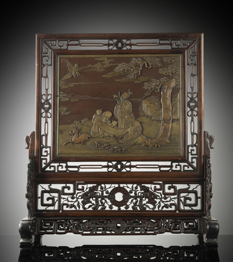 A fine carved Duan stone panel mounted as table screen