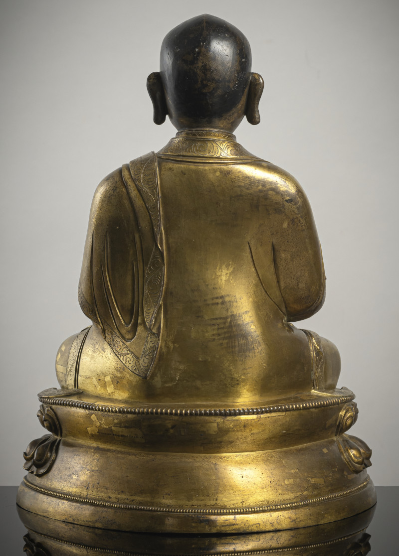 A large parcel gilt-bronze figure of a lama - 图2