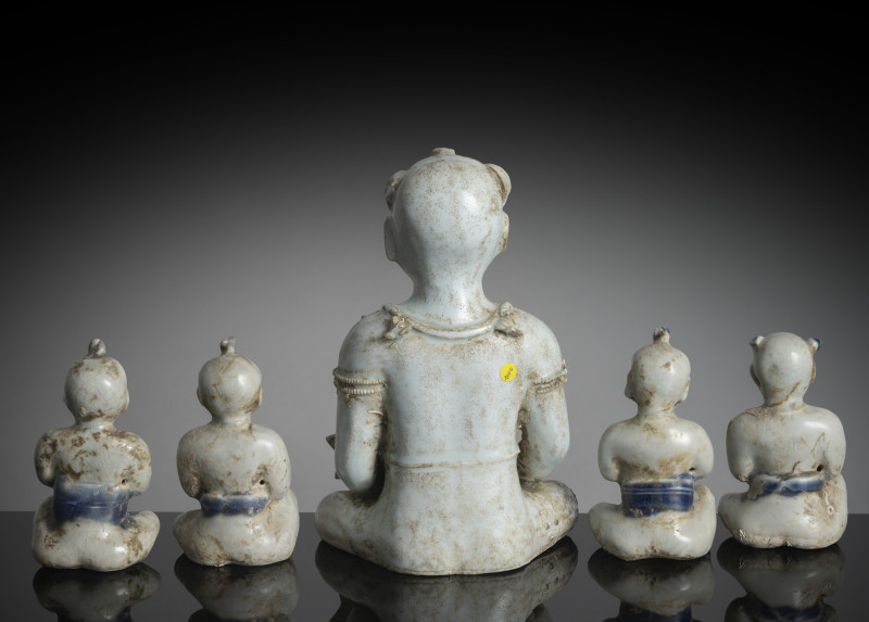 A large 'qingbai' style porcelain sculpture of a boy holding a fish and four small boys - 图2