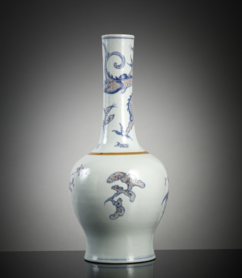 A bottle vase with copper-red and underglaze blue decoration of plum blossom branches, lingzhi and chilong - 图3