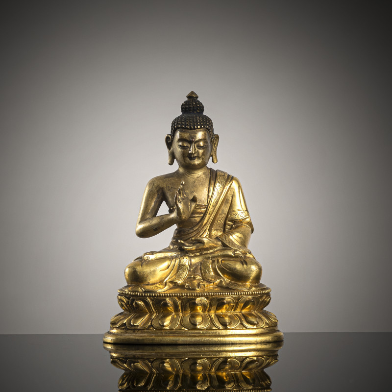 A PART-GILT BRONZE FIGURE OF BUDDHA SHAKYAMUNI