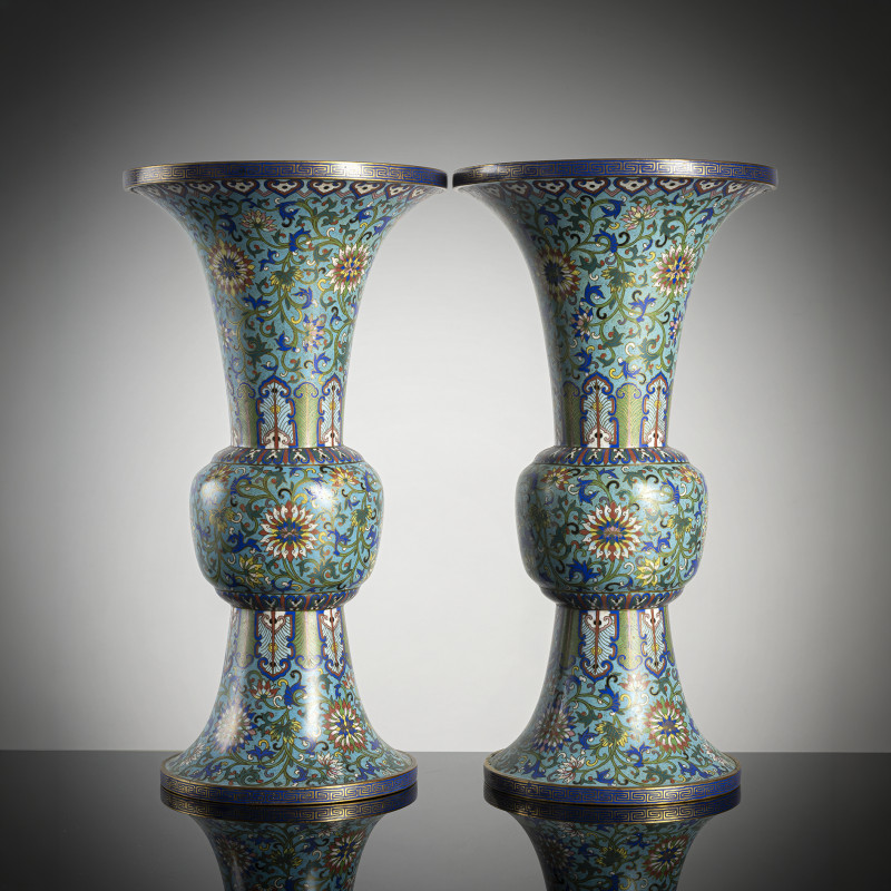 A pair of 'gu'-shaped cloisonné-enamelled lotus vases