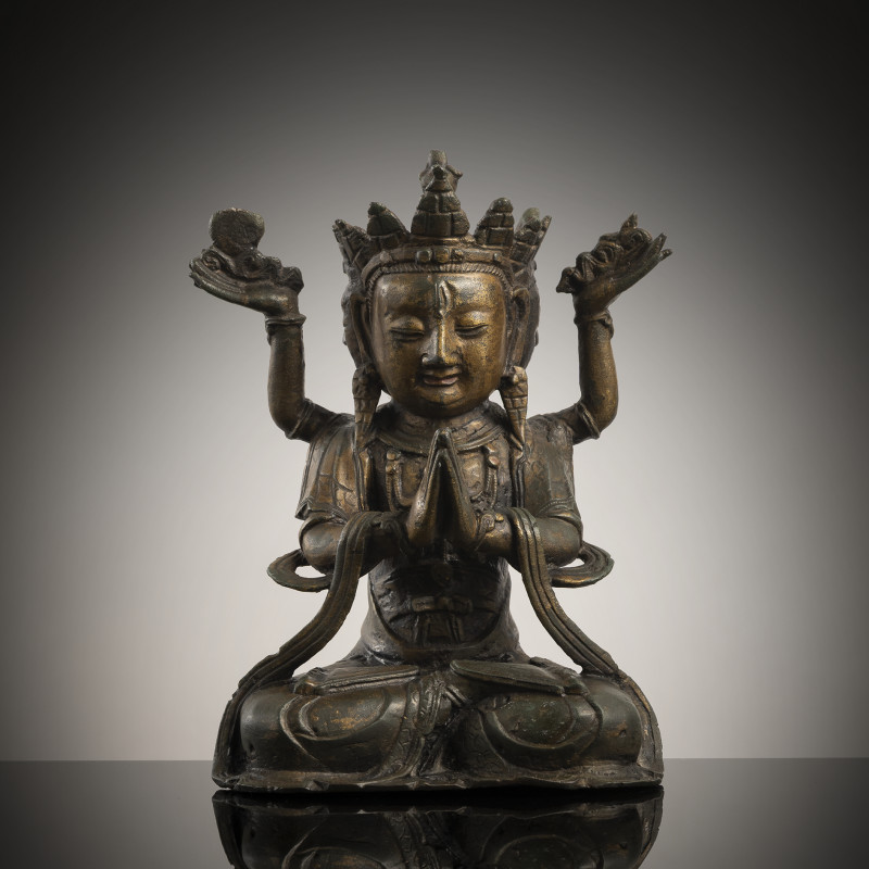 A GILT-LAQUERED BRONZE FIGURE OF GUANYIN