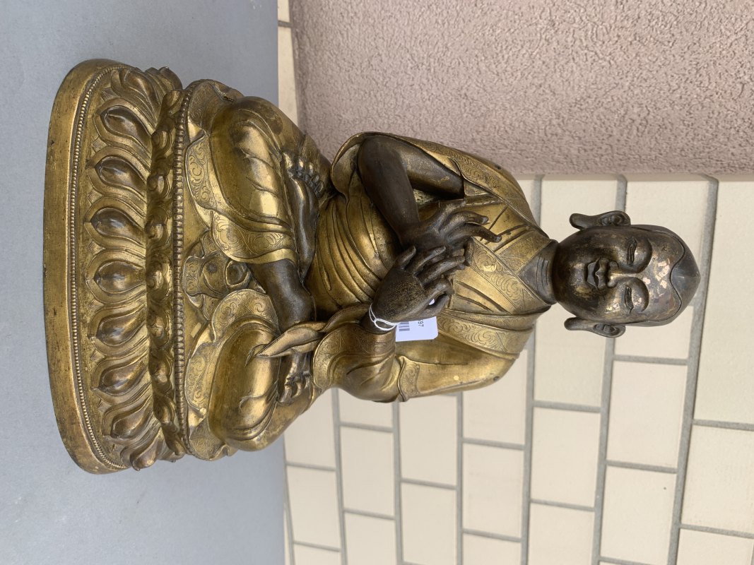 A large parcel gilt-bronze figure of a lama - 图6