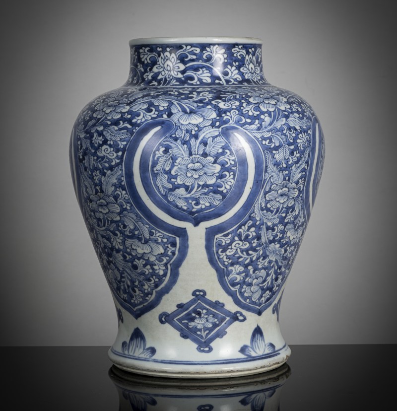 A porcelain vase with dense underglaze blue decoration of blossoms, including lotus - 图2