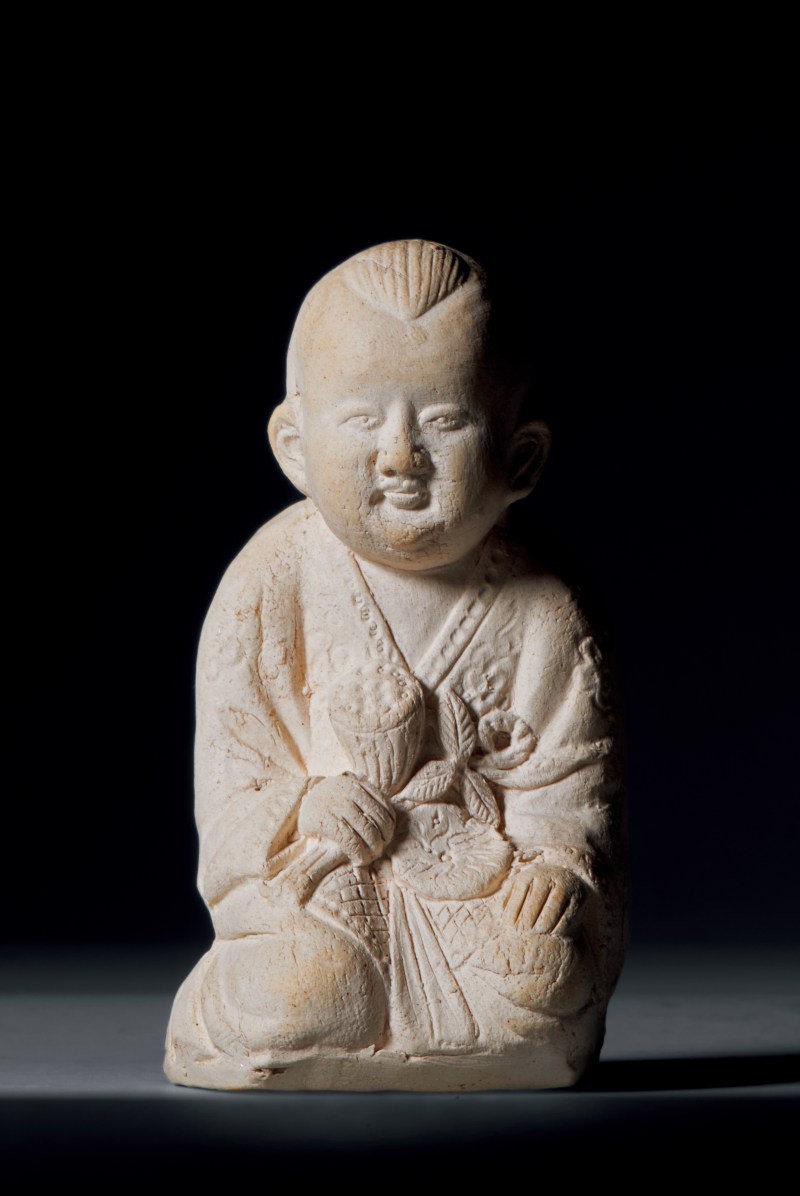 明代 素胎持莲童子