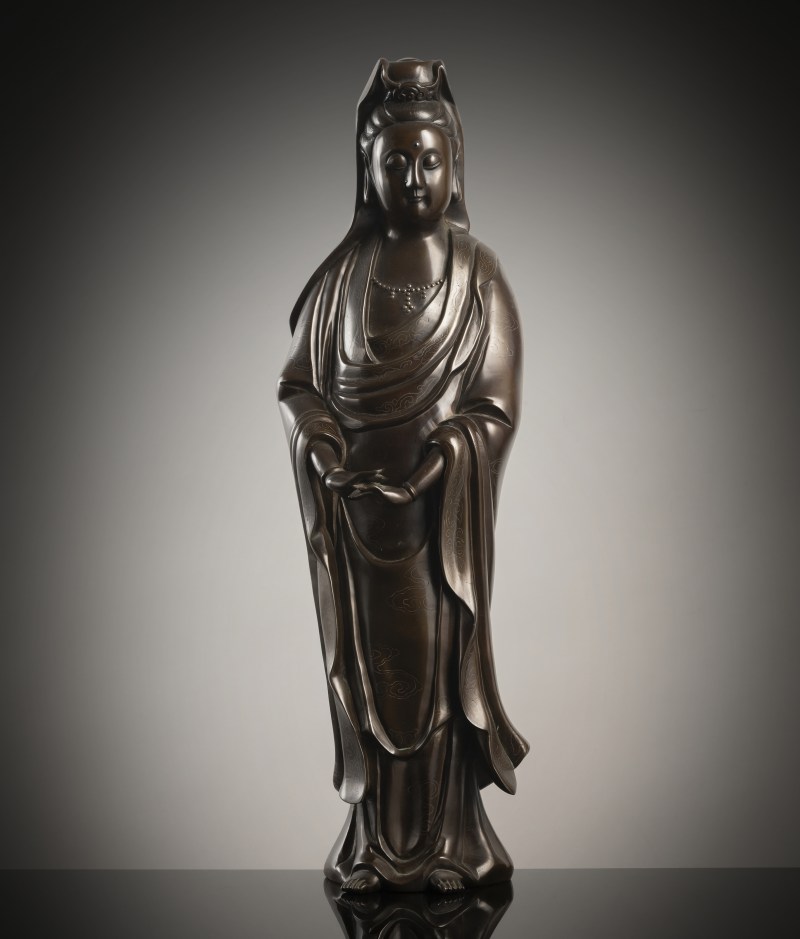 A fine silver-inlaid bronze figure of standing Guanyin