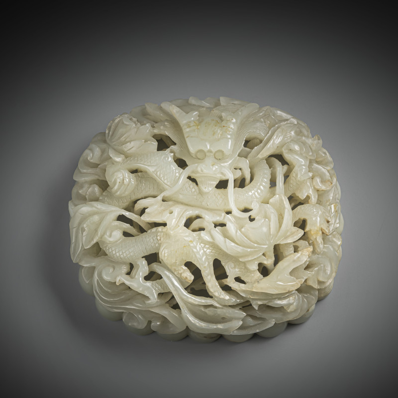 A fine plaque made of jade with dragon decoration in openwork with lotus for a ruyi