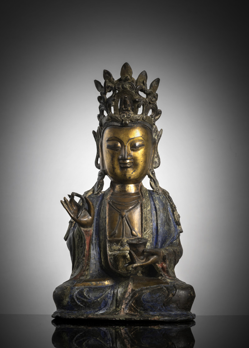 Polychrome painted and partially fire-gilt bronze of the crowned Guanyin