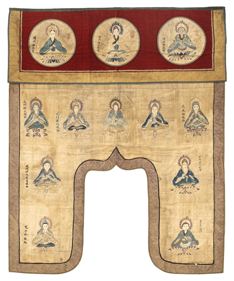 A hanging for a sacred space featuring twelve lamas
