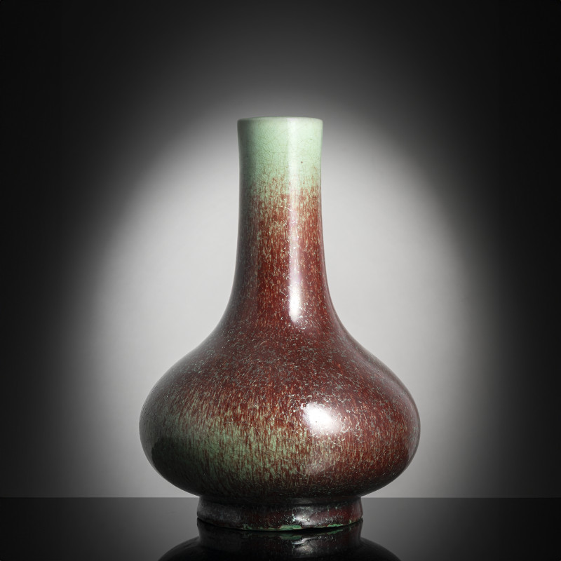 A Peachbloom-glazed porcelain bottle vase