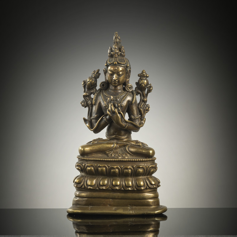 A BRONZE FIGURE OF MANJUSHRI