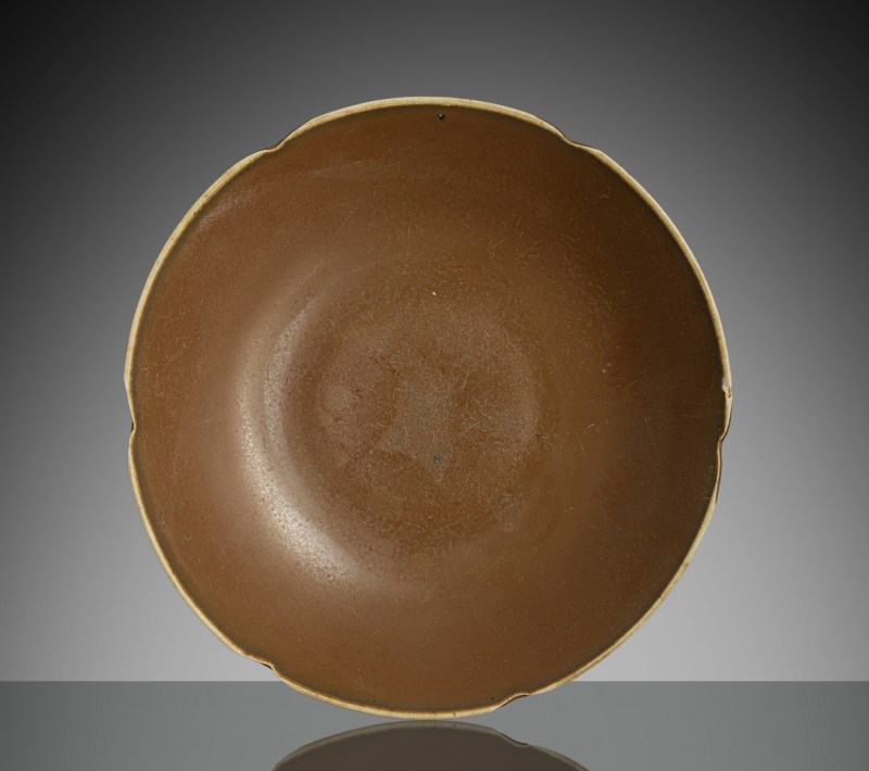 A fine persimmon-glazed 'ding' ware dish