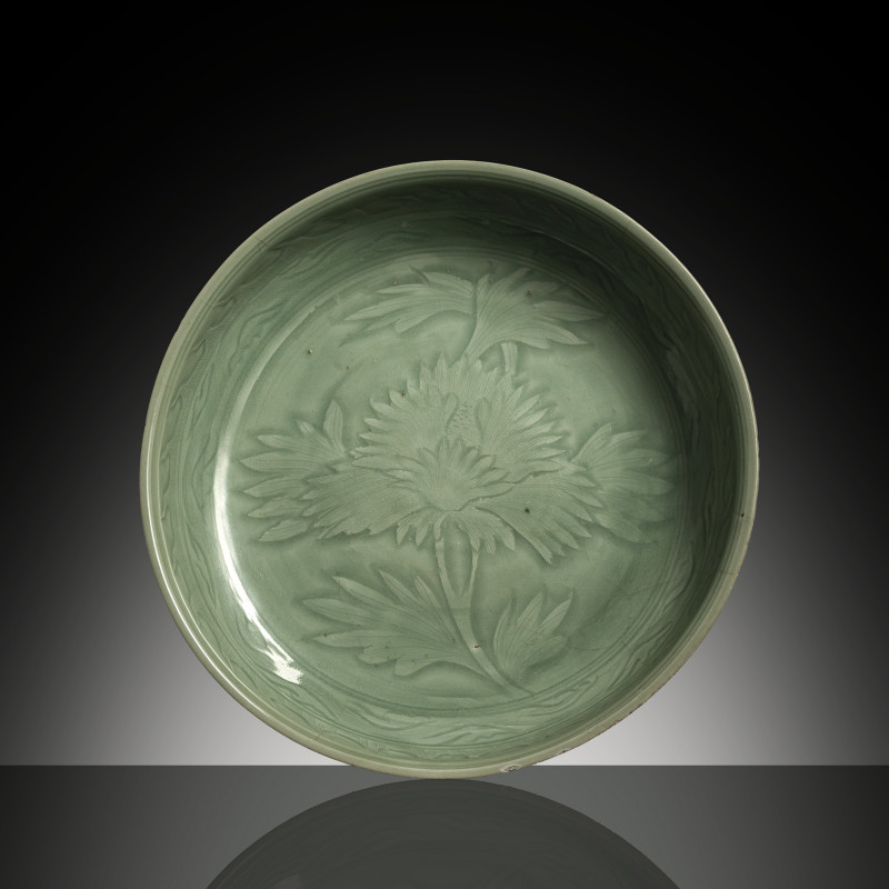 A RARE DEEP CELADON BOWL WITH A SINGLE PEONY BLOSSOM
