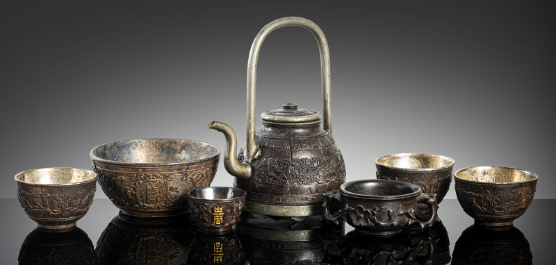 Four wine cups, a bowl and a jug made of coconut or wood and pewter