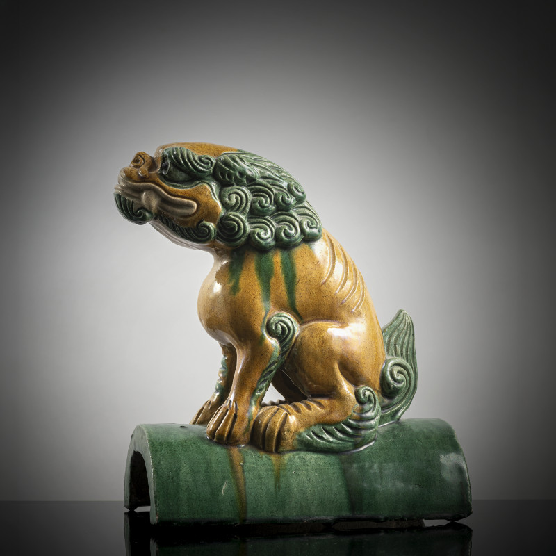 A 'sancai' glazed ceramic roof tile in the shape of a fo lion