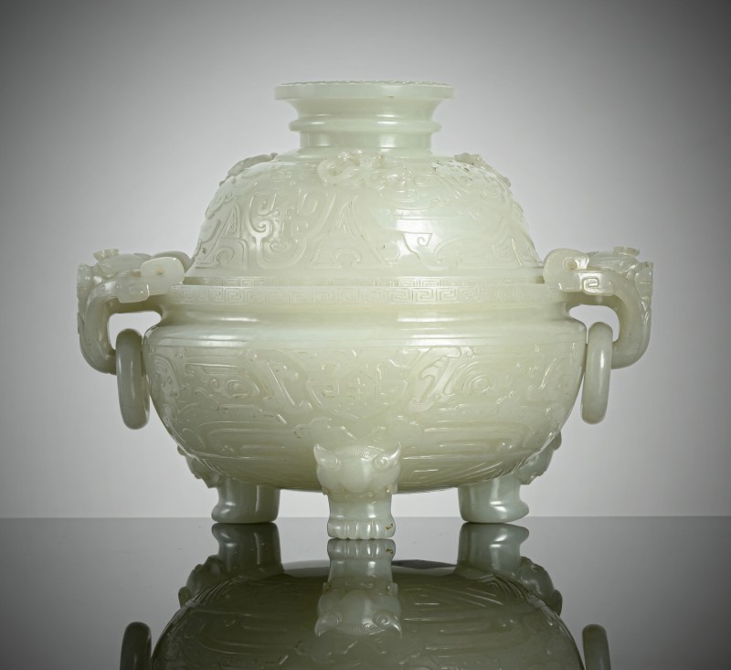 An exquisite carved light green jade censer and cover in archaic style