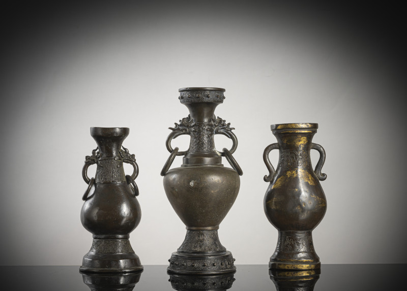 A group of three bronze vases, one with partial fire gilding - 图3