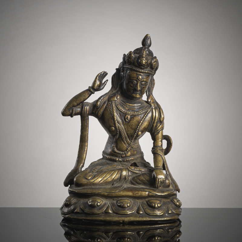 A BRONZE FIGURE OF NAMPAR GYALWA