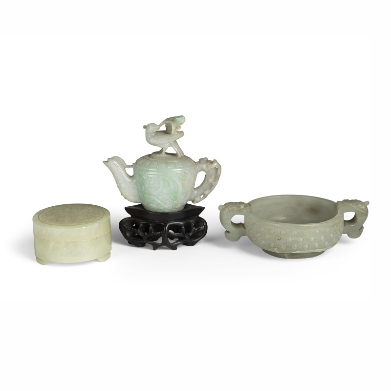 A carved jade box and cover, jadeite miniature ewer and cover and jade handled bowl with burl decoration, one wooden stand