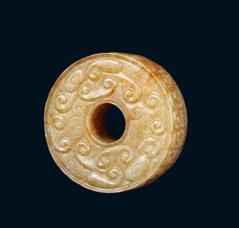 明 白玉勾云纹璧